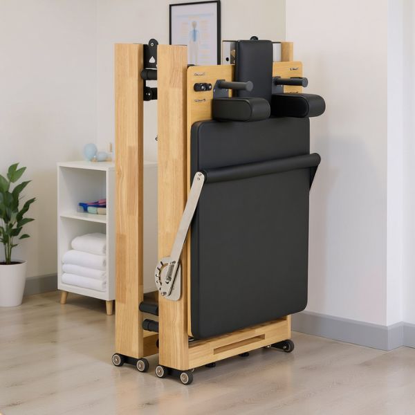 folding-pilates-reformer-home-gym.jpg Affinity Folding Pilates Reformer folded for storage